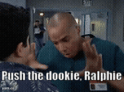 Two Men Talking In Hallway Saying Push The Dookie Ralphie GIF