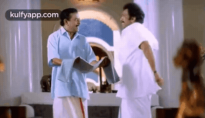 Two Men Talking In Living Room GIF