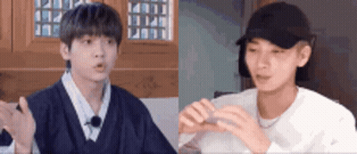 Two Men Talking In Room GIF