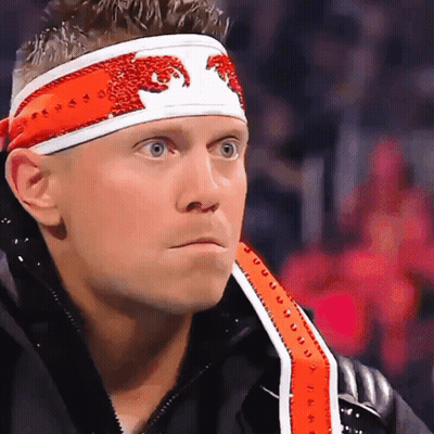 Two Men Talking In Wrestling Ring GIF