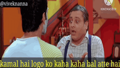 Two Men Talking Kamal Hai Logo Ko Kaha Kaha Bal Atte Hai GIF