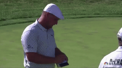 Two Men Talking On Golf Course GIF
