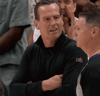 Two Men Talking One In Black Cavs Shirt GIF