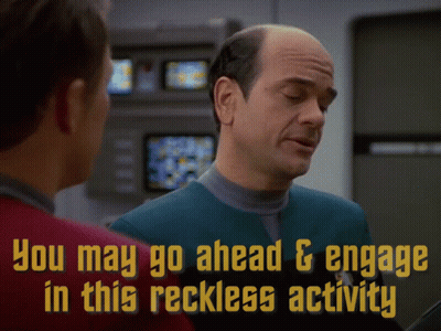 Two Men Talking You May Go Ahead Engage In This Reckless Activity GIF