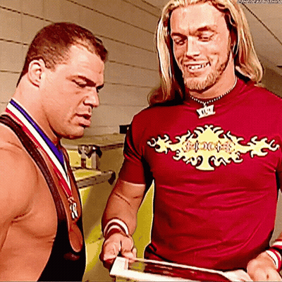 Two Men Together One With Medal GIF
