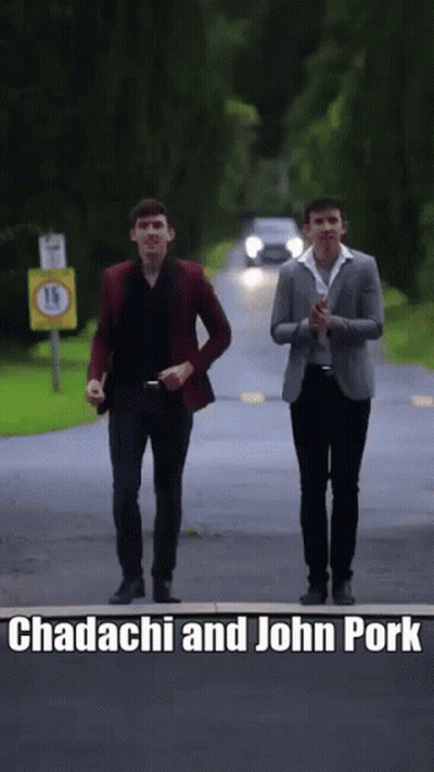 Two Men Walking Down A Road With The Words Chadachi And John Pork Written On The Bottom GIF