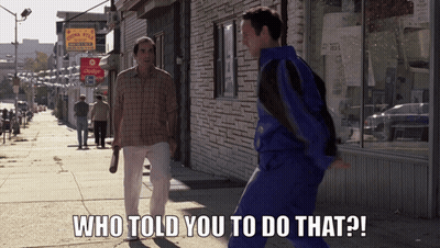 Two Men Walking Down Sidewalk Saying Who Told You To Do That GIF