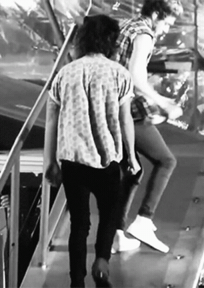 Two Men Walking Down Stairs Black And White GIF