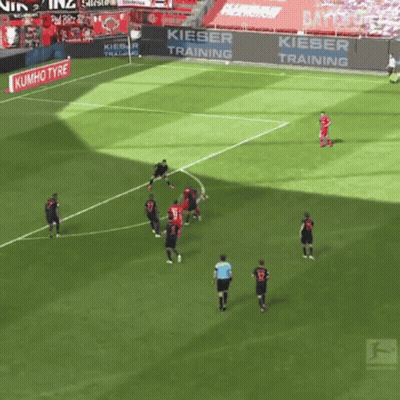 Two Men Walking On Field One Wearing AXA Shirt GIF