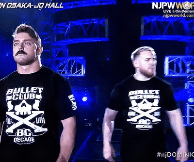Two Men Wearing Bullet Club Bc Decade T-Shirts GIF