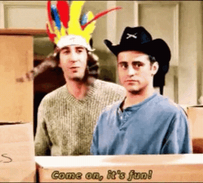 Two Men Wearing Cowboy Hats Are Standing Next To Each Other In Front Of Boxes . GIF
