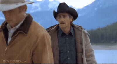Two Men Wearing Cowboy Hats Are Standing Next To Each Other With Movieclips.com Written On The Bottom Of The Screen GIF