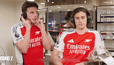 Two Men Wearing Emirates Jerseys GIF