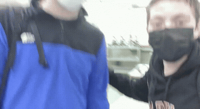 Two Men Wearing Face Masks GIF