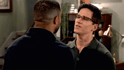 Two Men Wearing Glasses Talking GIF