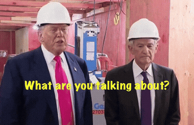 Two Men Wearing Hard Hats Are Standing Next To Each Other With The Words What Are You Talking About GIF