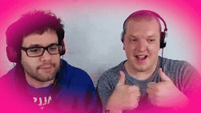Two Men Wearing Headphones Are Giving A Thumbs Up Sign GIF