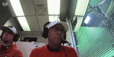 Two Men Wearing Headphones Sitting In Room GIF