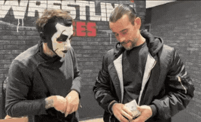 Two Men Wearing Masks Standing GIF