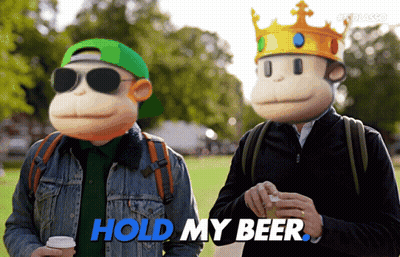 Two Men Wearing Monkey Masks Are Standing Next To Each Other And One Says Hold My Beer GIF