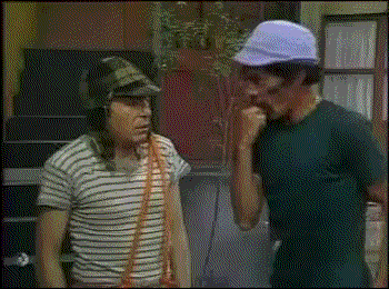 Two Men Wearing Striped Shirts And Hats Are Standing Next To Each Other And Talking . GIF