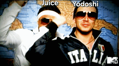 Two Men Wearing Sunglasses And A Jacket That Says Italia Are Posing For A Picture GIF