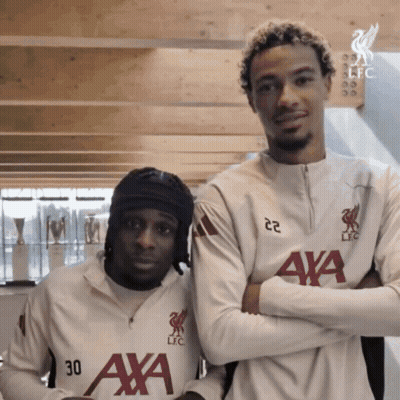 Two Men With Arms Crossed One Wearing Jersey 30 GIF