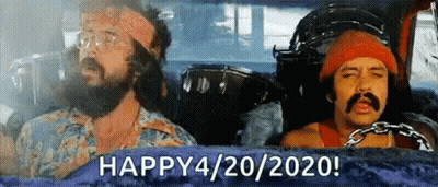 Two Men With Beards And Mustaches Are Sitting In A Car With A Drum In The Background . GIF