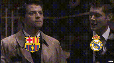 Two Men With FCB And Real Madrid Logos GIF
