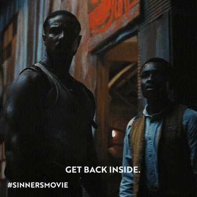 Two Men With Get Back Inside GIF