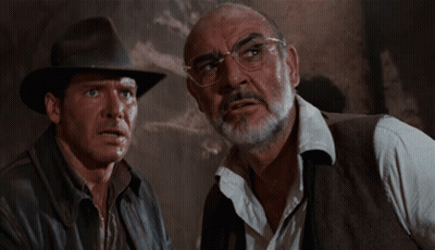 Two Men With Glasses And Beard Looking GIF