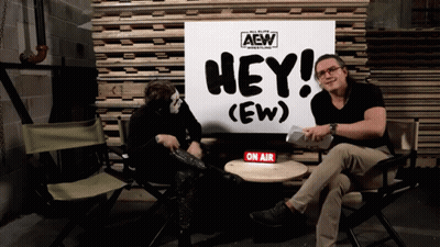 Two Men With Hey Sign GIF
