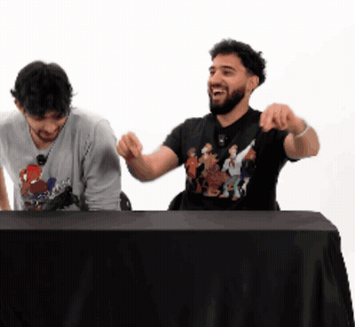 Two Men With Raised Hands Cartoon Shirt GIF