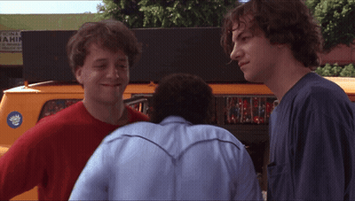 Two Men With Yamaha Sticker On Back GIF