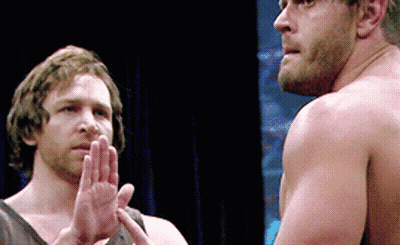 Two Men Without Shirts Are Standing Next To Each Other With Their Hands Together GIF