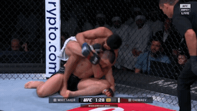 Two Men Wrestling Boxing Ring Crypto.com Banner GIF