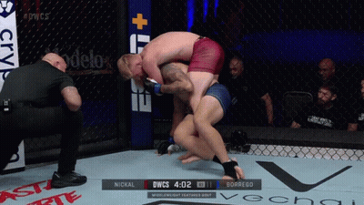 Two Men Wrestling In Cage Scoreboard DWCS GIF