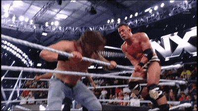 Two Men Wrestling In NX Ring GIF