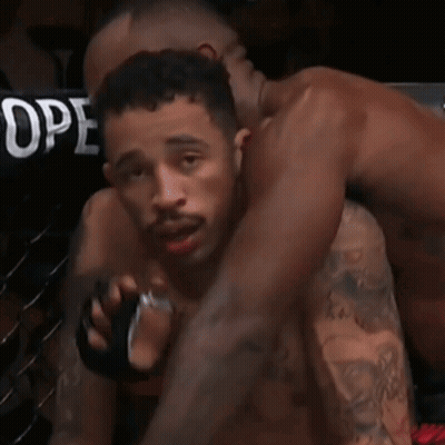 Two Men Wrestling In Ring GIF
