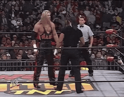 Two Men Wrestling In Ring GIF
