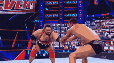 Two Men Wrestling In Ring GIF