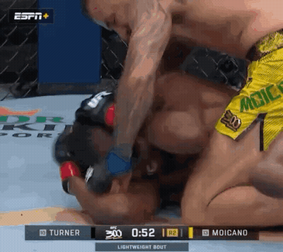 Two Men Wrestling In Ring, One In Yellow Mexico Shorts GIF