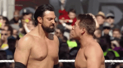 Two Men Wrestling In Ring GIF