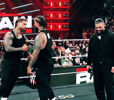 Two Men Wrestling In Ring With 5G Sign GIF