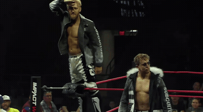 Two Men Wrestling In Ring With Impact Jacket GIF