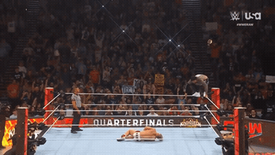 Two Men Wrestling In Ring With MMA Boxing Glove GIF