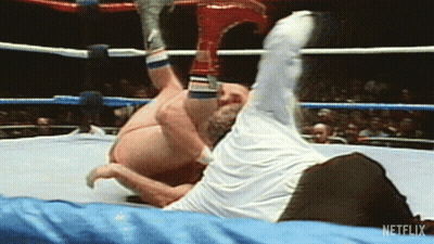 Two Men Wrestling In Ring With Netflix GIF
