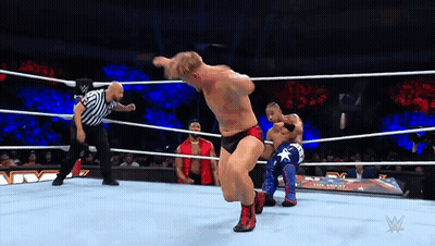 Two Men Wrestling In Ring With Referee GIF