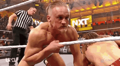 Two Men Wrestling In Ring With Referee GIF