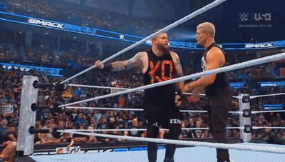 Two Men Wrestling In Ring With USA Sign GIF